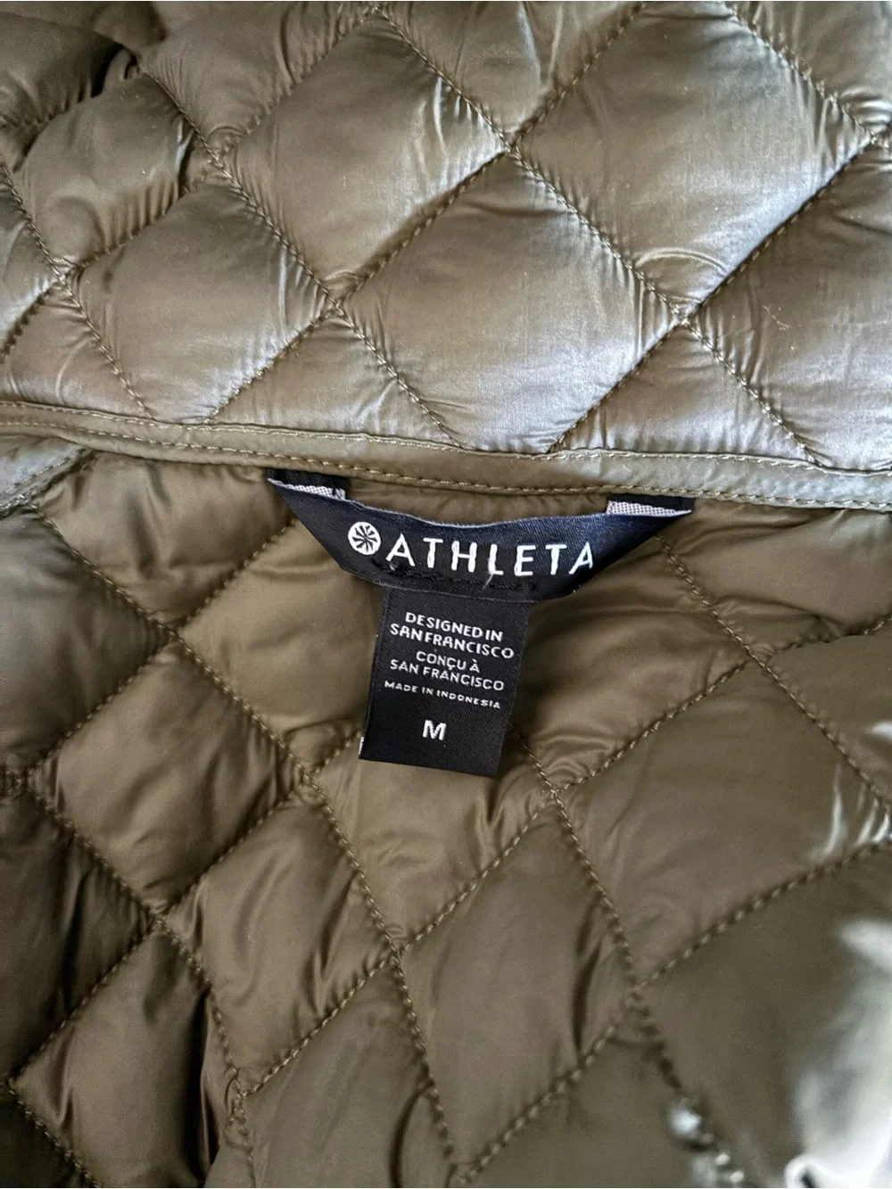 New condition. Athleta whisper featherless jacket.